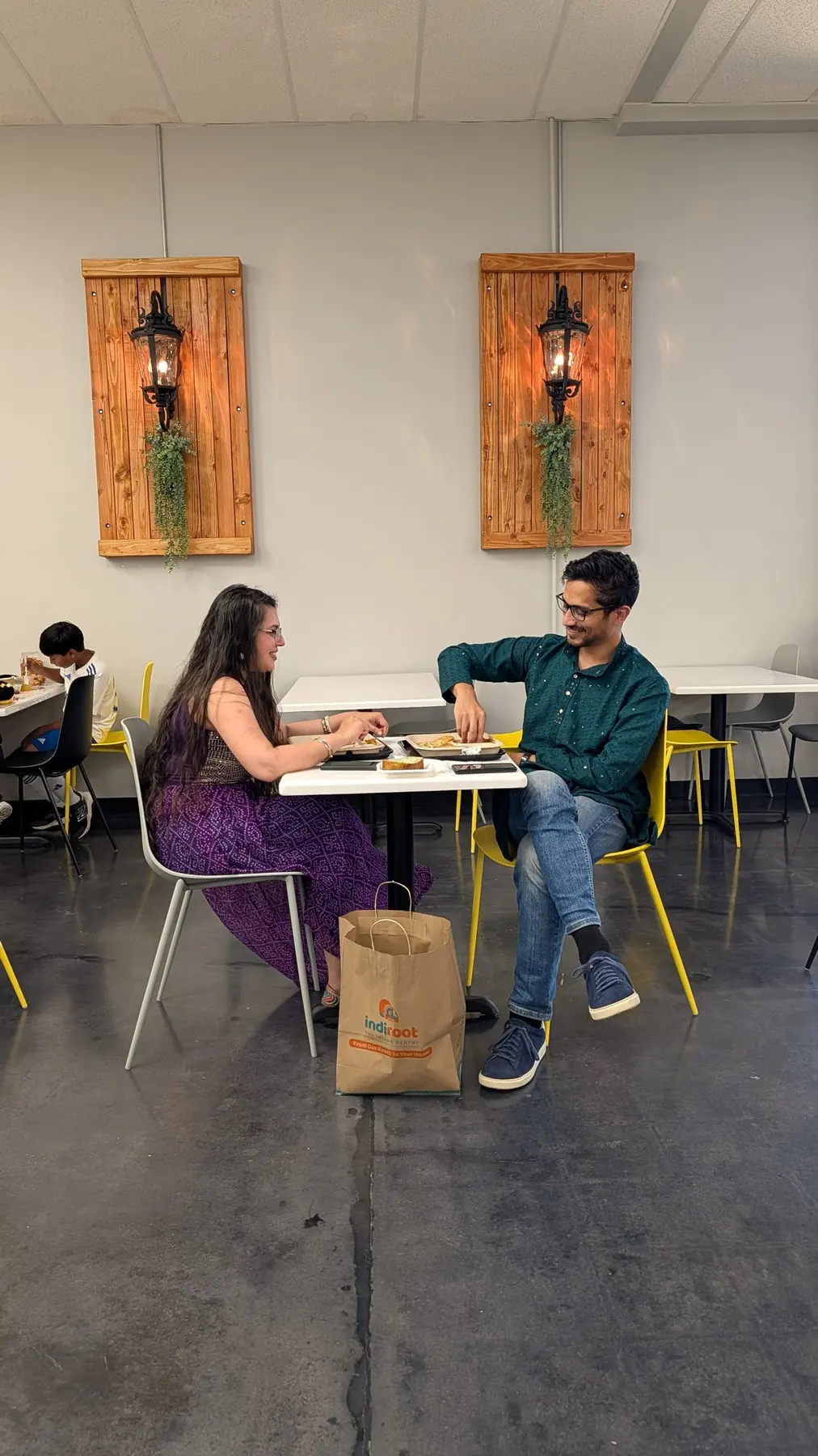 Two guests at a café table