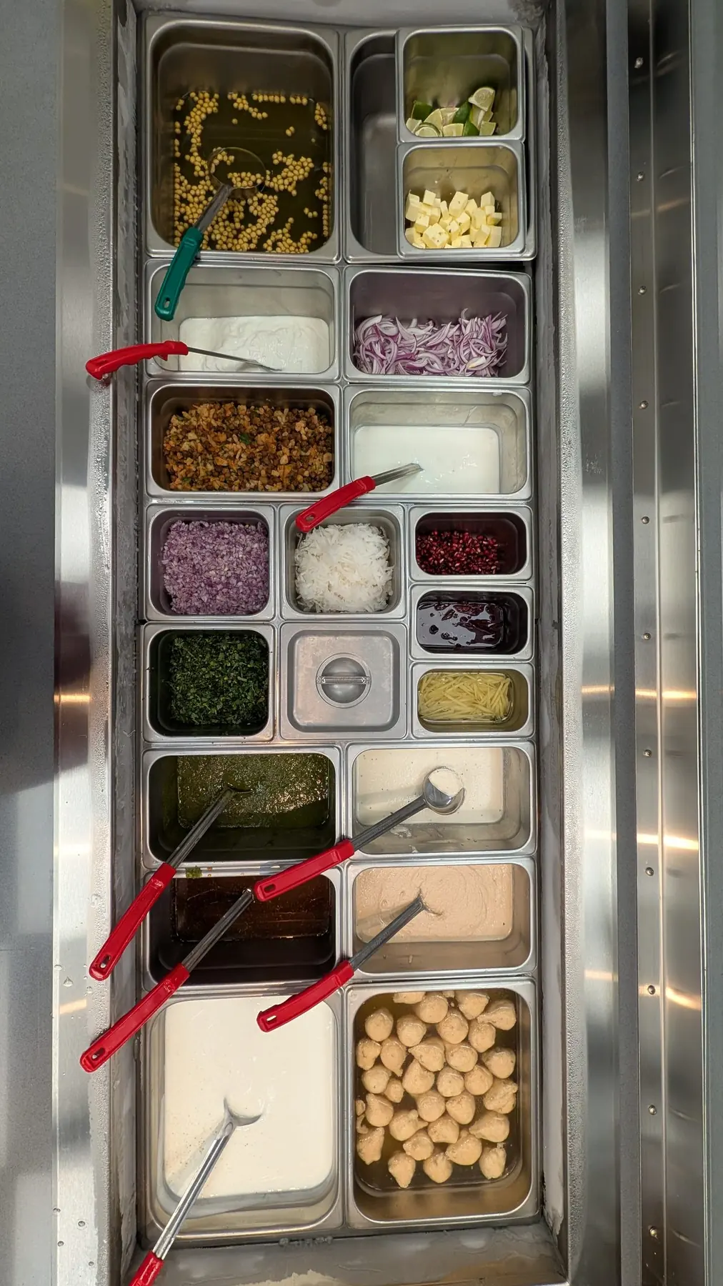 The chaat station: onions, chutneys, sev