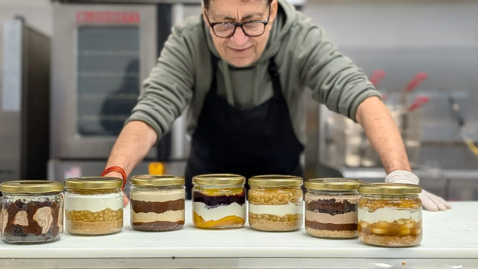 The baker lining up dessert jars