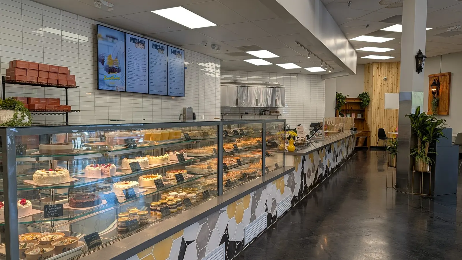 The Sitara bakery counter with cakes and pastries