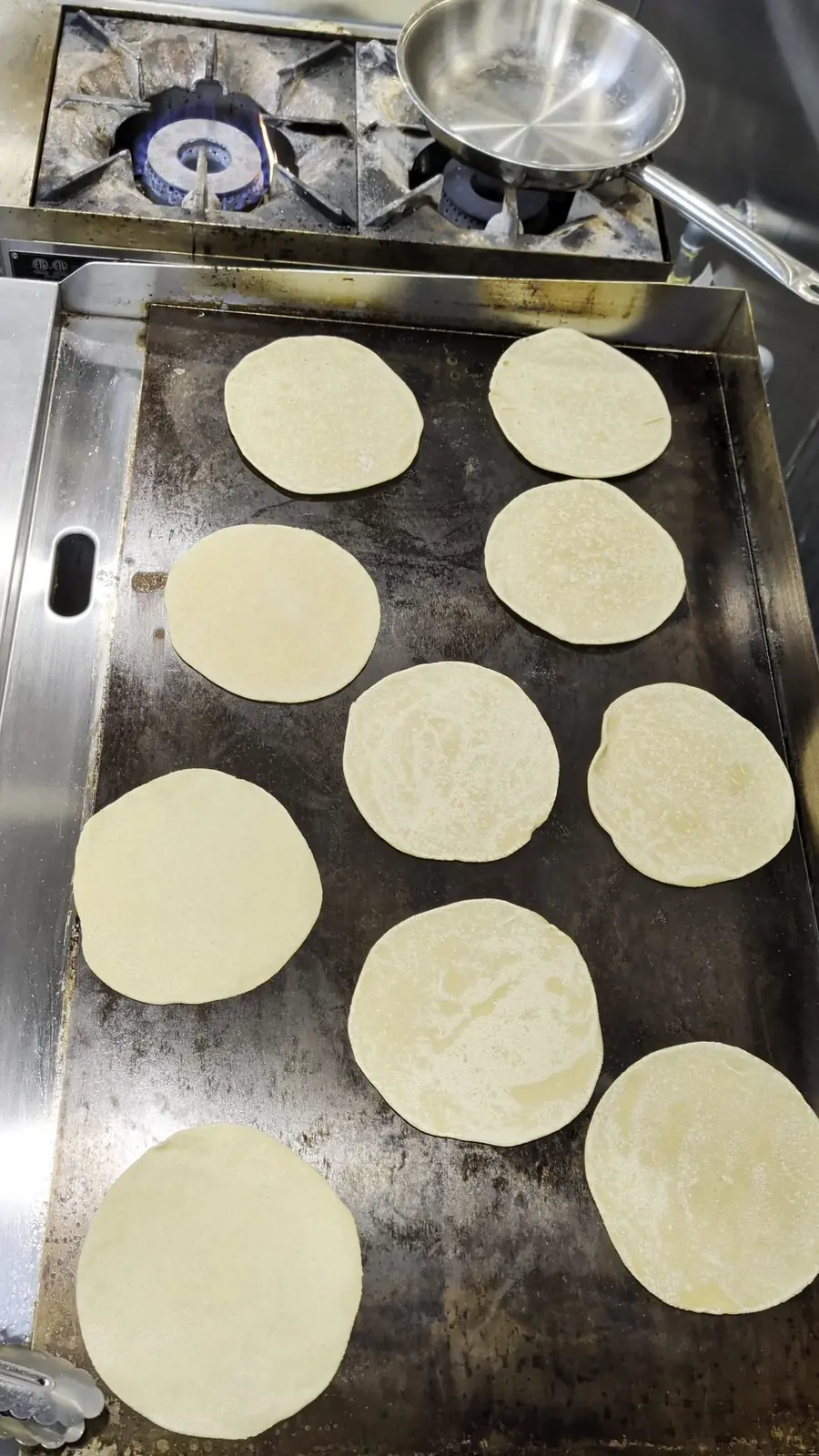 Rotis puffing on the tawa