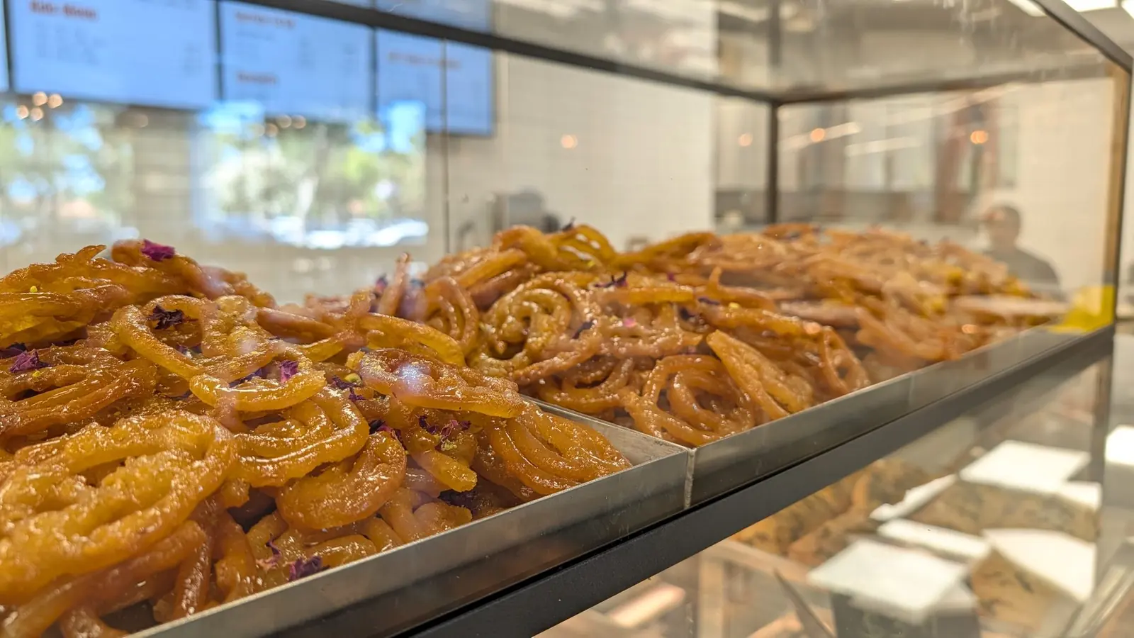 Trays of fresh jalebi in the Sitara case