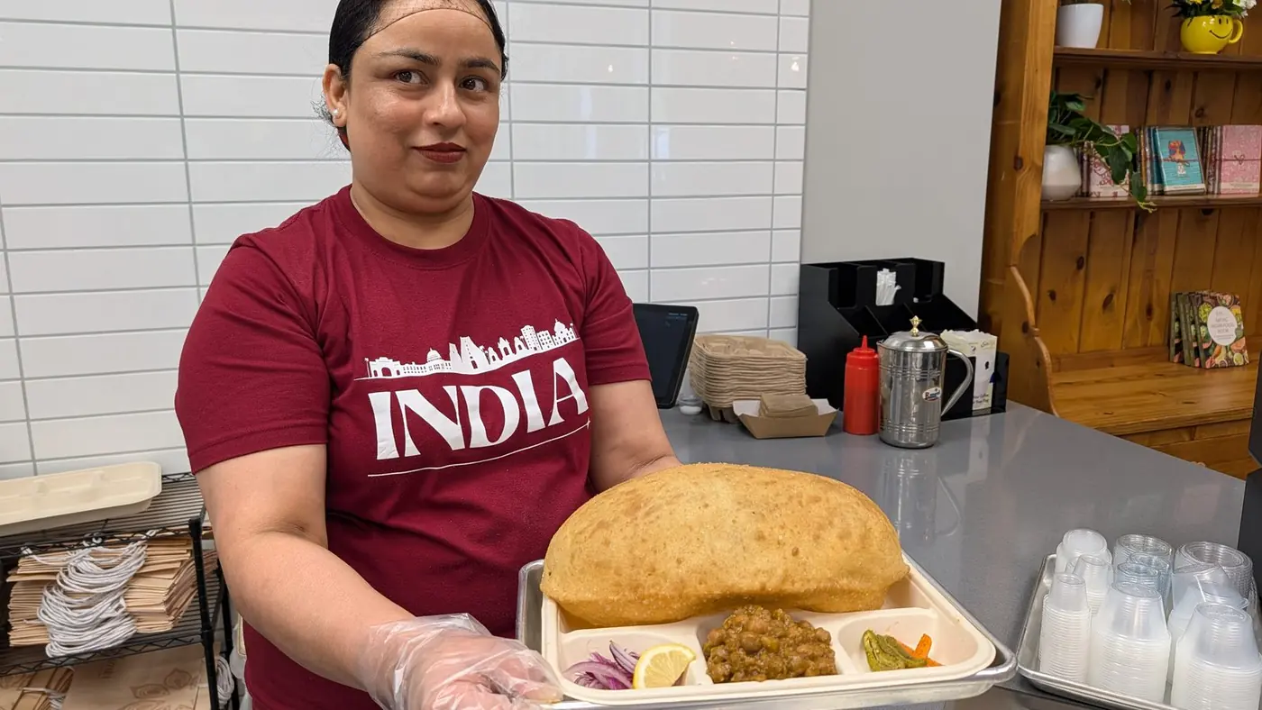 Sitara team member with a giant bhatura